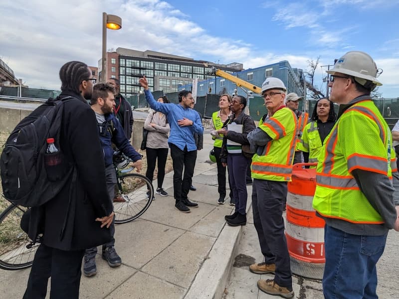 Commissioner Sahni explaining neighborhood foot traffic to members of DDOT's Vision Zero task force, council representatives, and construction management.